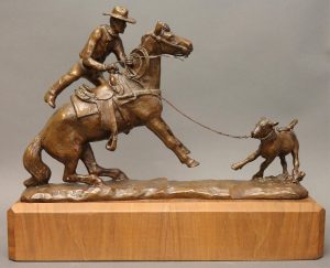 Charles A. (Charlie) Beil: CALF ROPING