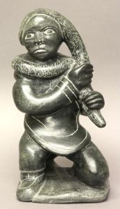 Unidentified Inuit Artist: INUIT WOMAN KNEELING
