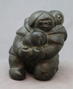 Unidentified Inuit Artist: WOMAN IN AMAUTI WITH CHILD HOLDING A BIRD