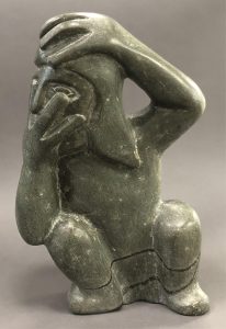 Tomasie (Thomassie) *: MAN WITH HANDS ON HIS FACE AND HEAD