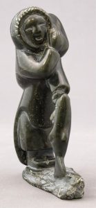 Oviloo Tunnillie: WOMAN CARRYING A FISH