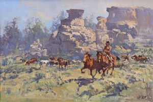 Jack King: NATIVE AMERICAN RIDER WITH HORSES IN A DESERT CANYON