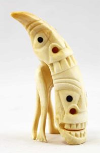Tupilak, Artist Unidentified: Greenlandic Inuit [20th century] carved marine ivory with baleen inlay